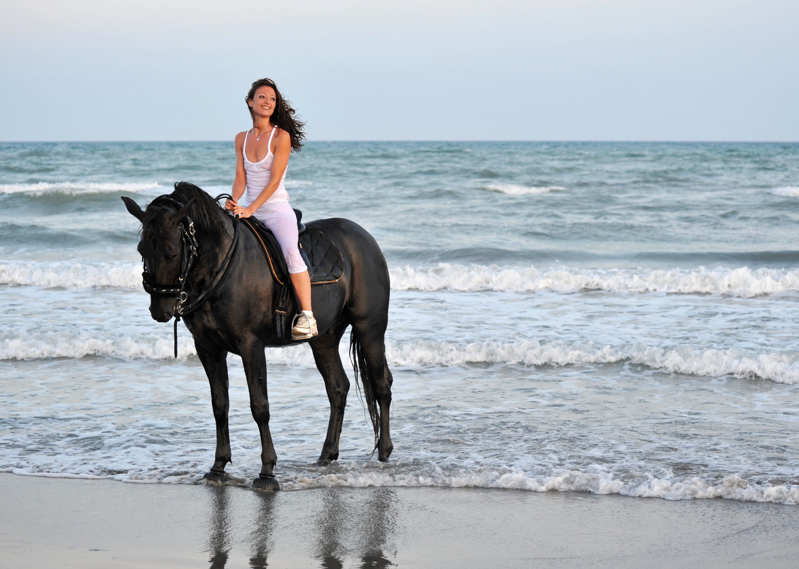 cartagena riding girl on a beach